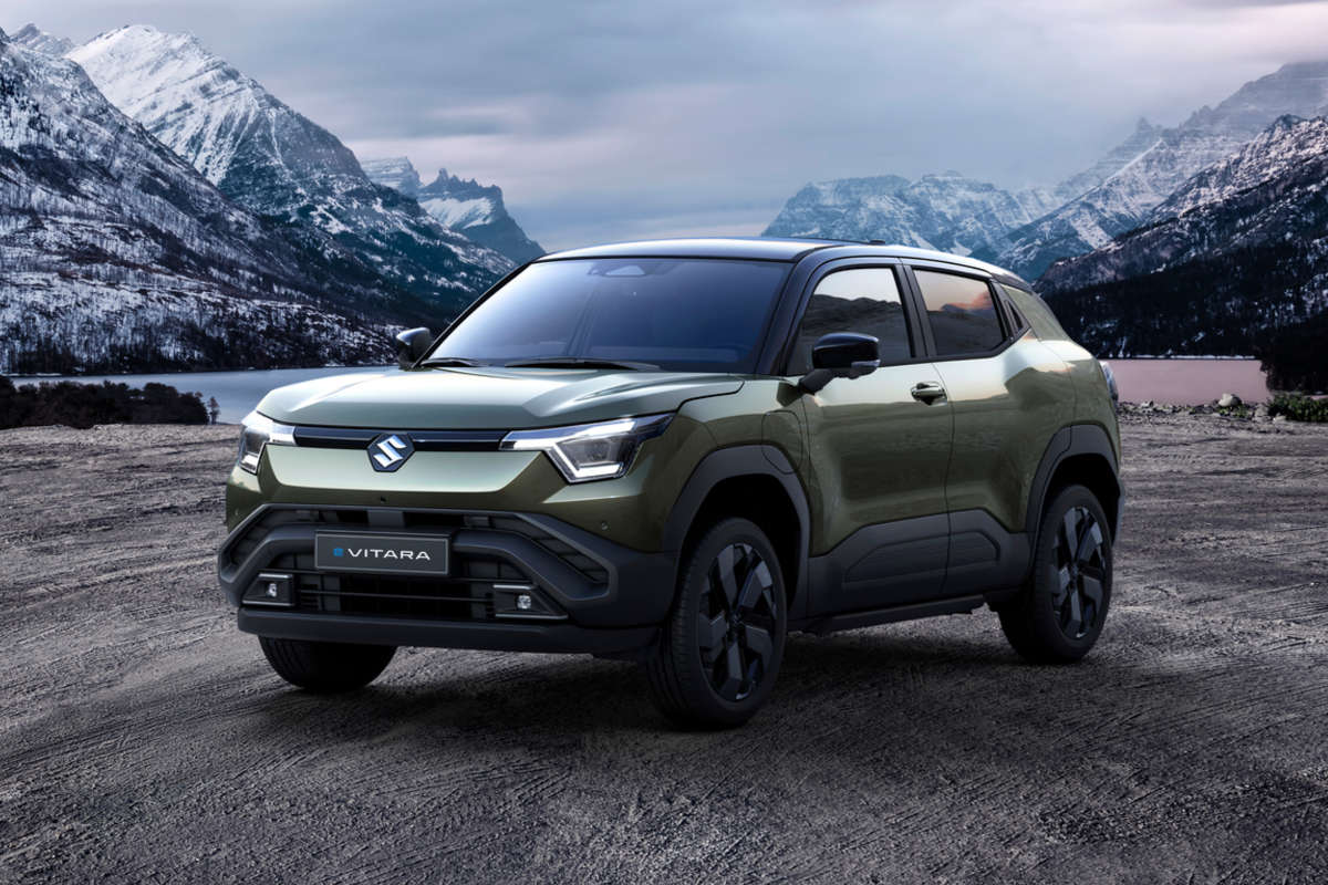 empty dirt beach with traces against Canadian Rockies, AB, Canada.